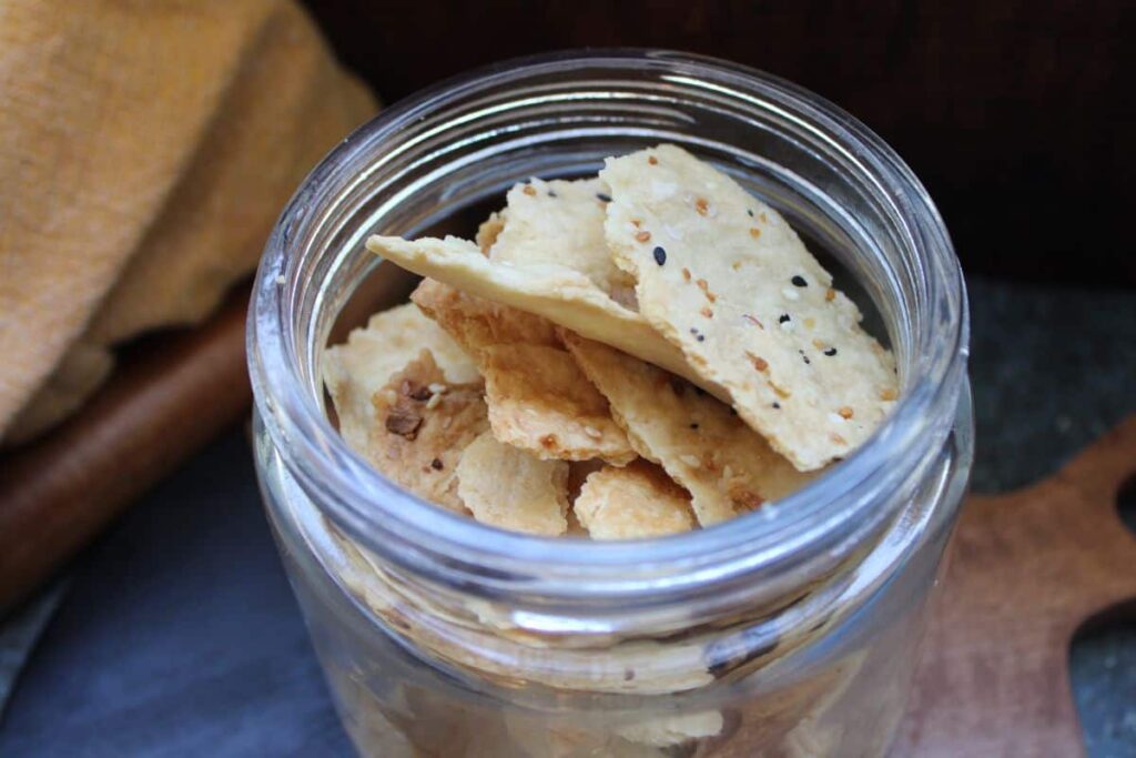 Sourdough discard crackers in a jar.