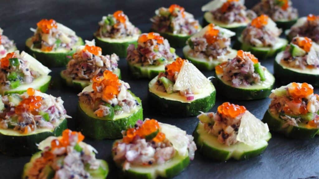 Tuna Salad as appetizer on a pieces of baked zucchini.