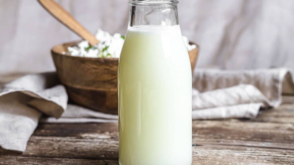 Natural Whey Protein Drink in a glass milk bottle. 