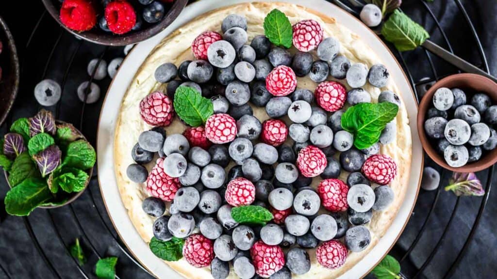 Instant Pot Keto Cheesecake with frozen berries on top. 