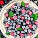 Instant Pot Keto Cheesecake with frozen berries on top.