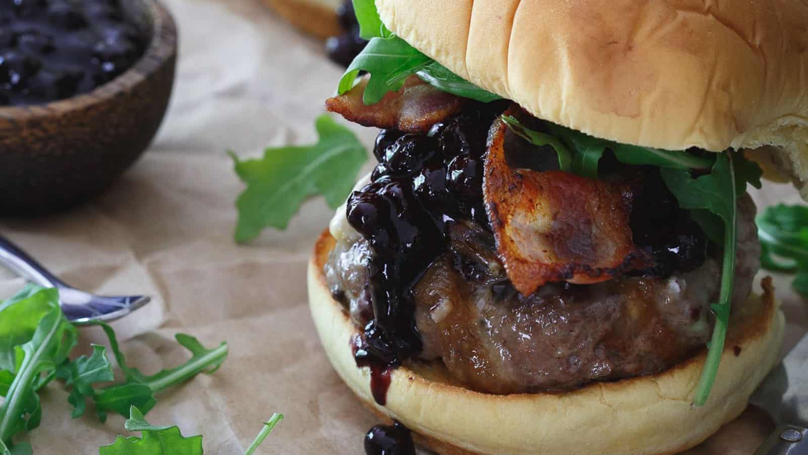 Blueberry BBQ brie burger with arugula.