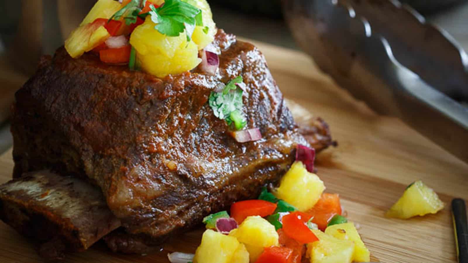 Grilled BBQ short ribs with tropical salsa.
