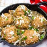 Chicken Marsala Meatballs in a black dish.