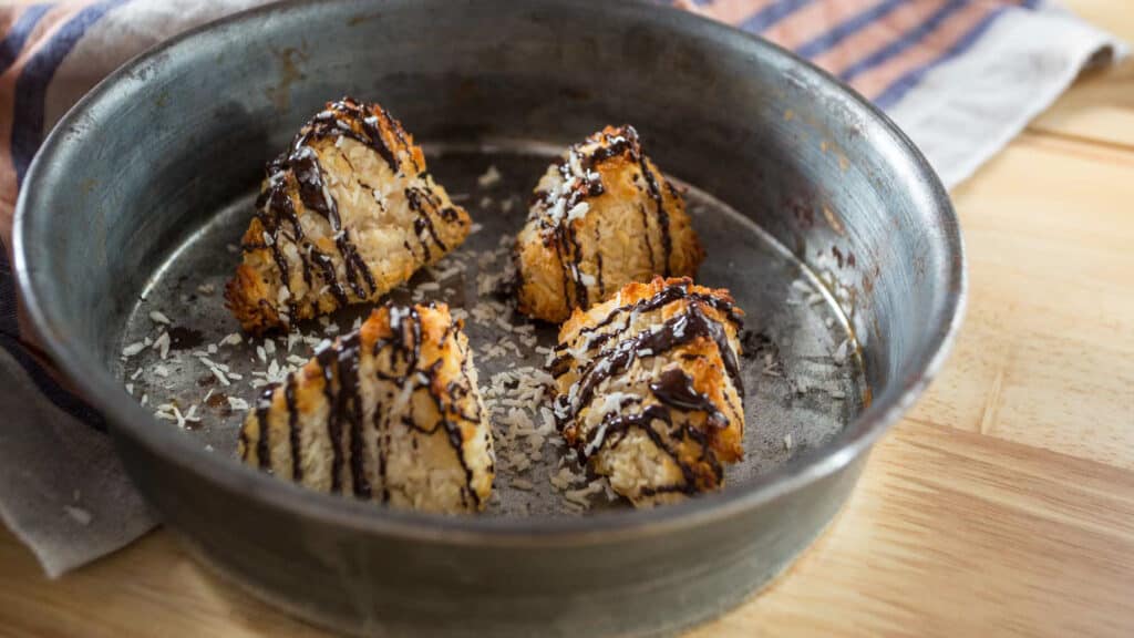 4 coconut macaroons on baking dish