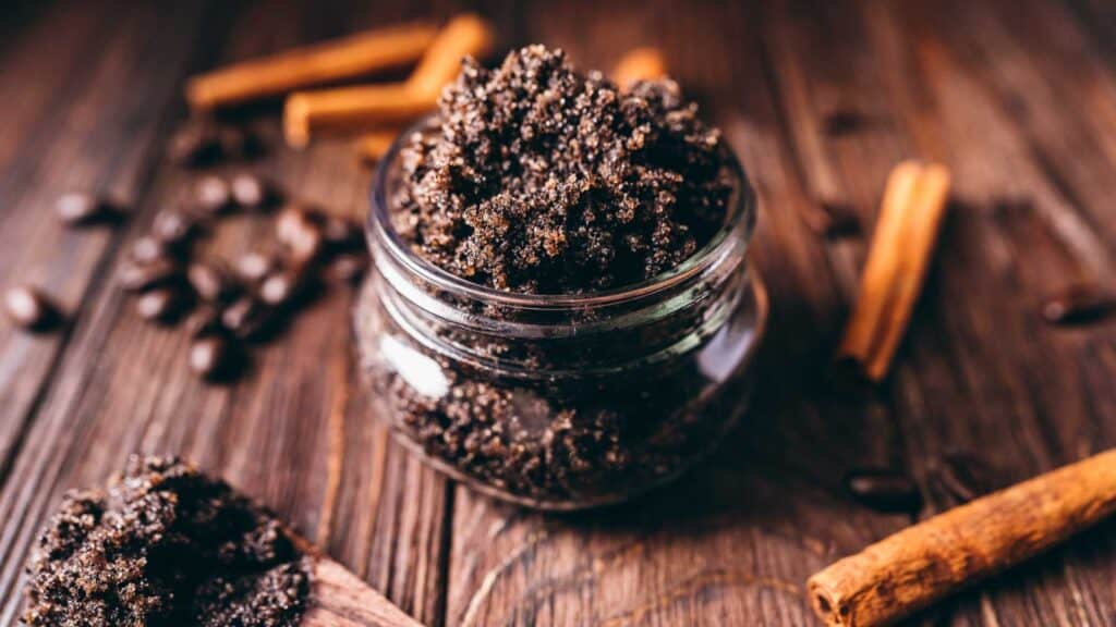 Small glass jar filled with homemade coffee scrub.