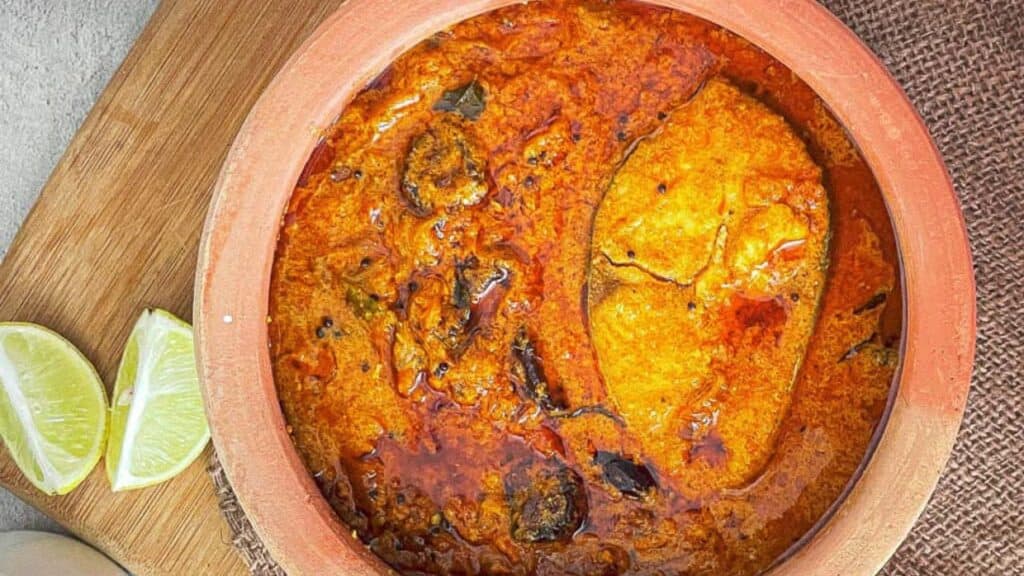 Kerala shrimp curry in an earthenware bowl.