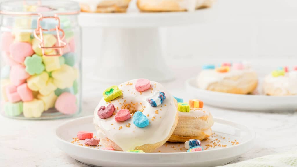 Homemade donuts with marshmallow shapes on top.