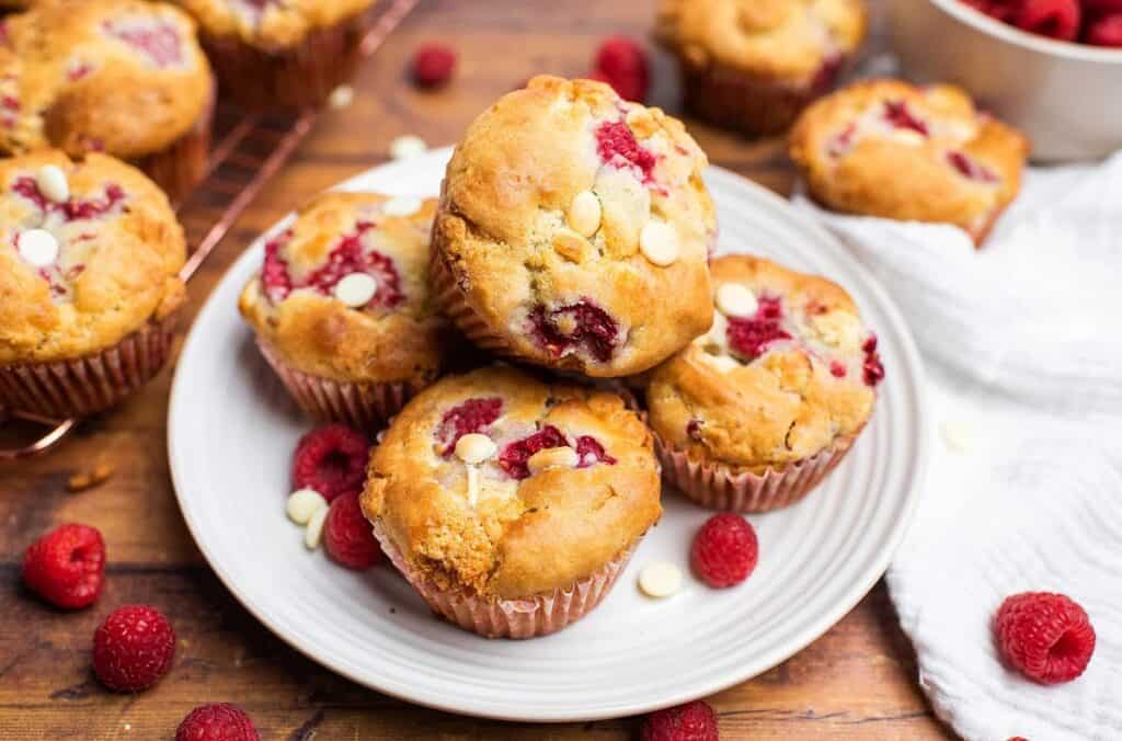 White chocolate raspberry muffins on a plate