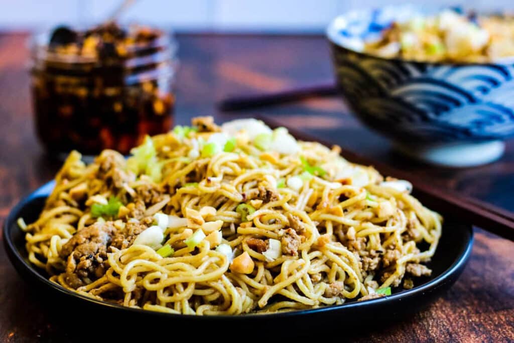 Sesame noodles on a plate.