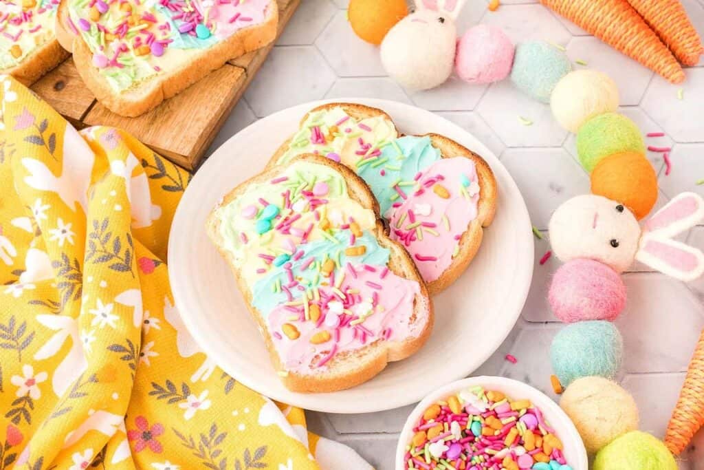 Rainbow cream cheese toast on a plate.