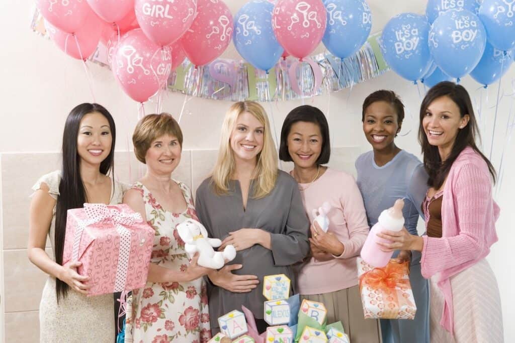 multiracial group of women gathering for a baby shower.