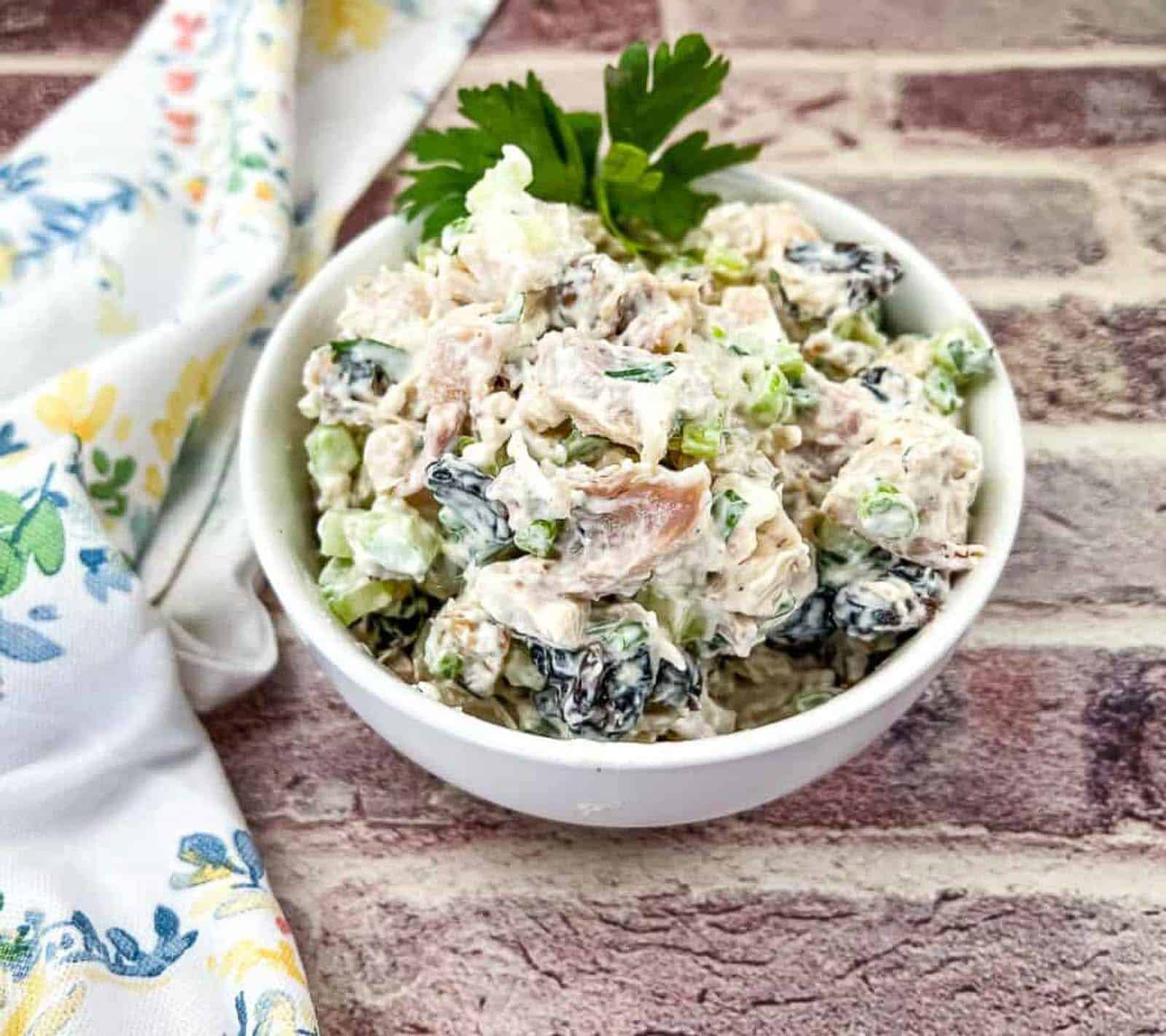 Chicken Salad with Walnuts & Cranberries in a bowl.