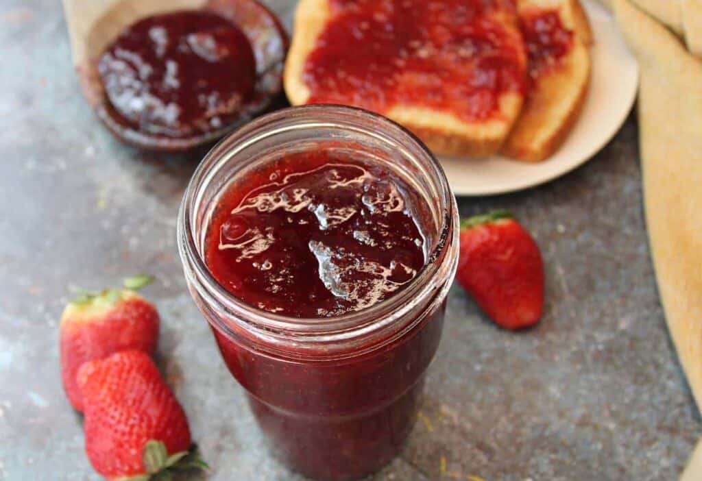 Mason jar of homemade strawberry jam.