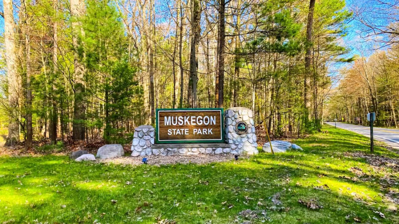 Muskegon State Park sign at the entrance.