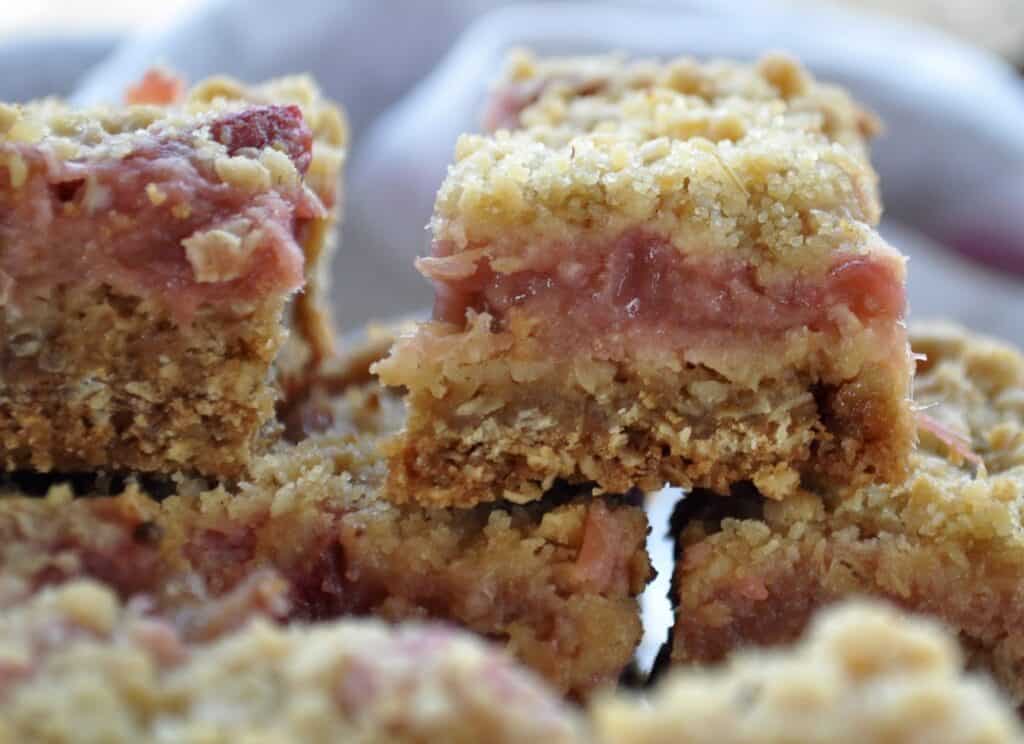 Rhubarb Bars stacked on top of each other.