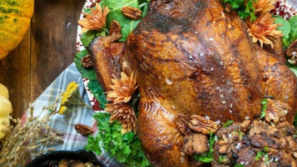 Smoked turkey on a fully dressed table. 