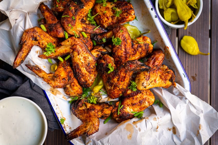 Pile of grilled chicken wings.