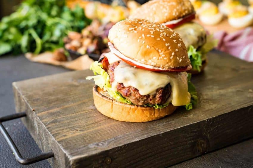 Close up of a huge veal burger.