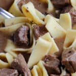 Closeup of Slow Cooker beef with egg noodles.