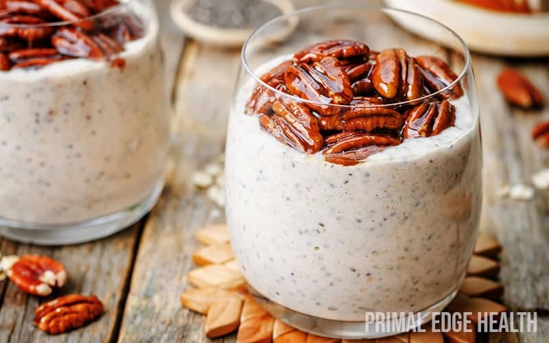 Chai latte chia pudding with pecans on top.