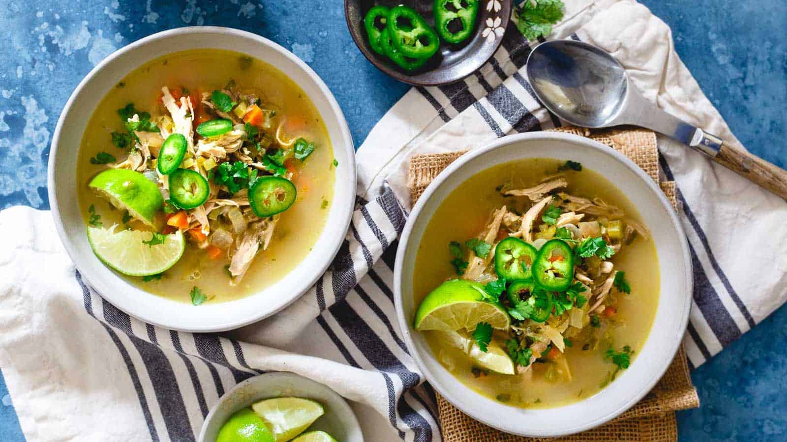 Spicy chicken lime soup in bowls.