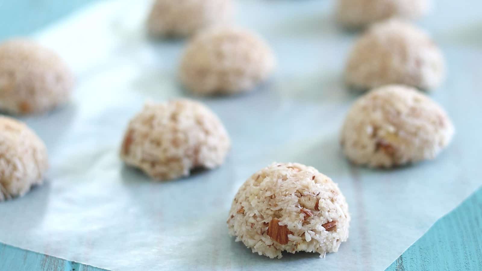 Coconut almond macaroons on parchment paper.