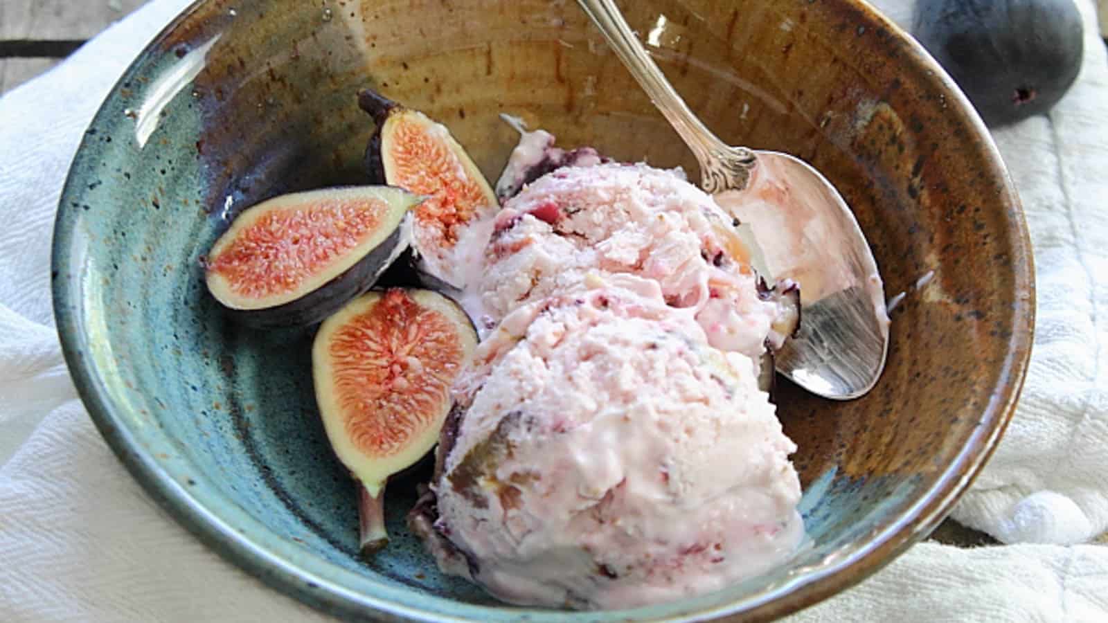 Frozen yogurt with figs in a bowl.