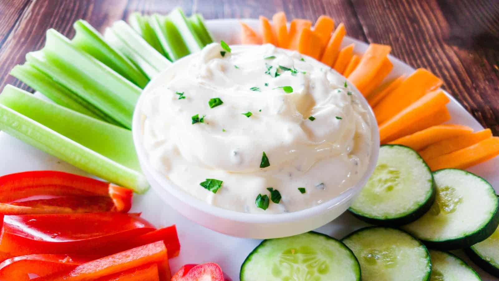 A picture of easy 3-Ingredient Onion Dip with vegetable sticks.