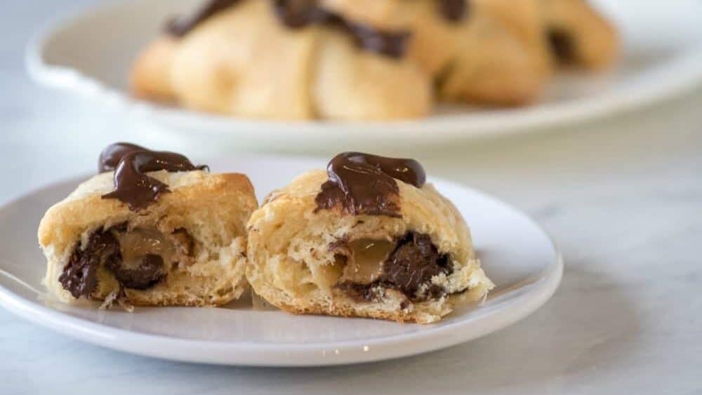Peanut butter chocolate rolls cut open to show the filling.