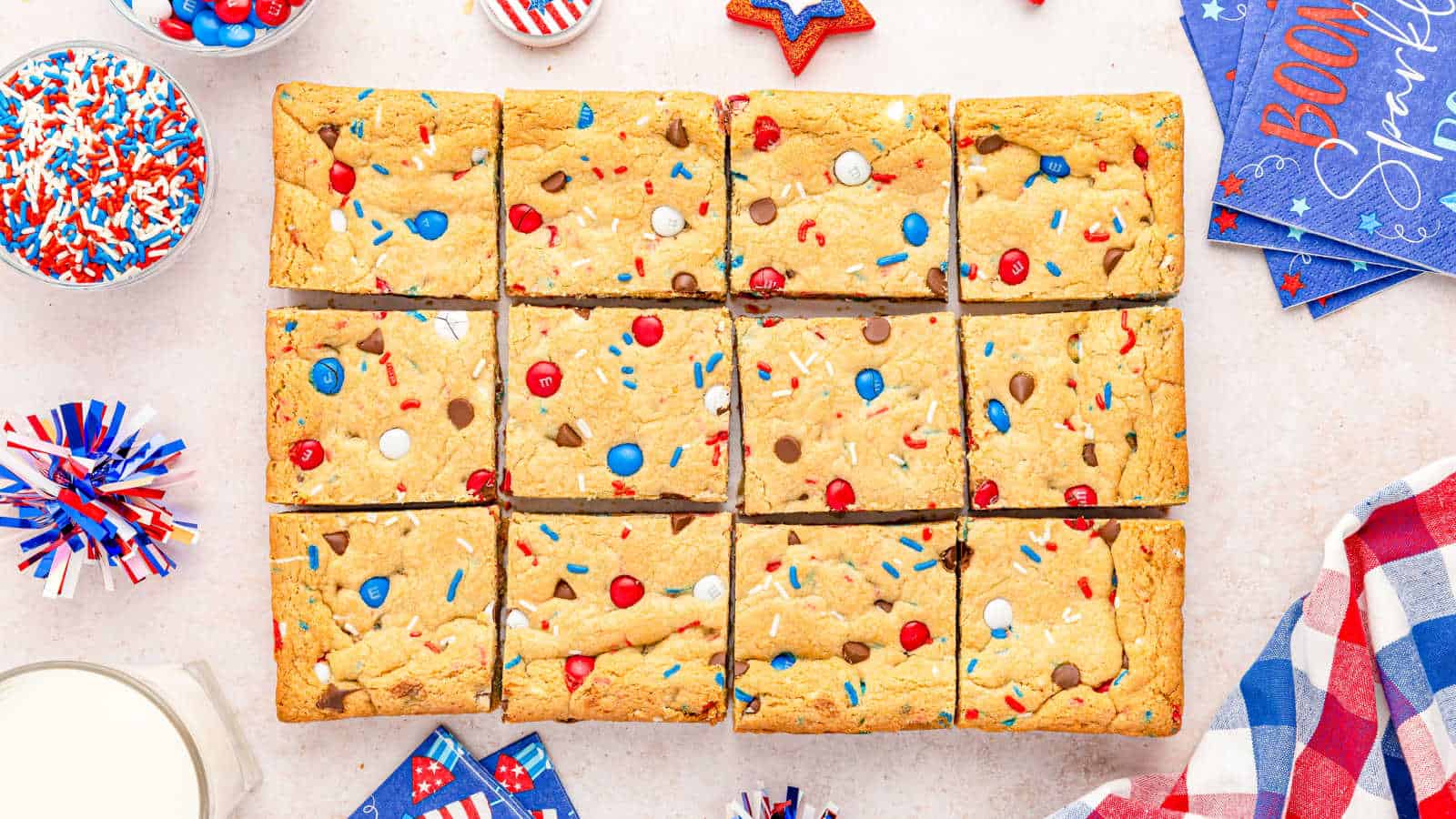 M&M sugar cookie bars cut into squares.