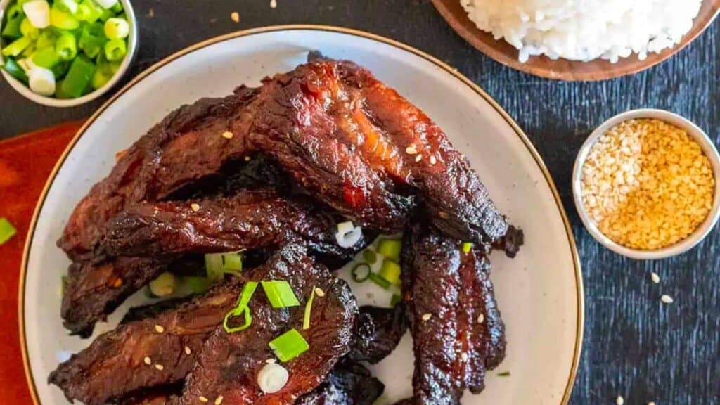 plate of grilled beef finger ribs.