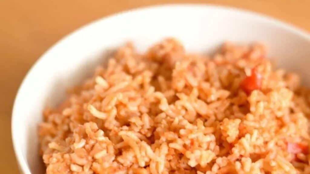 Image shows a Bowl of Spanish rice close up.