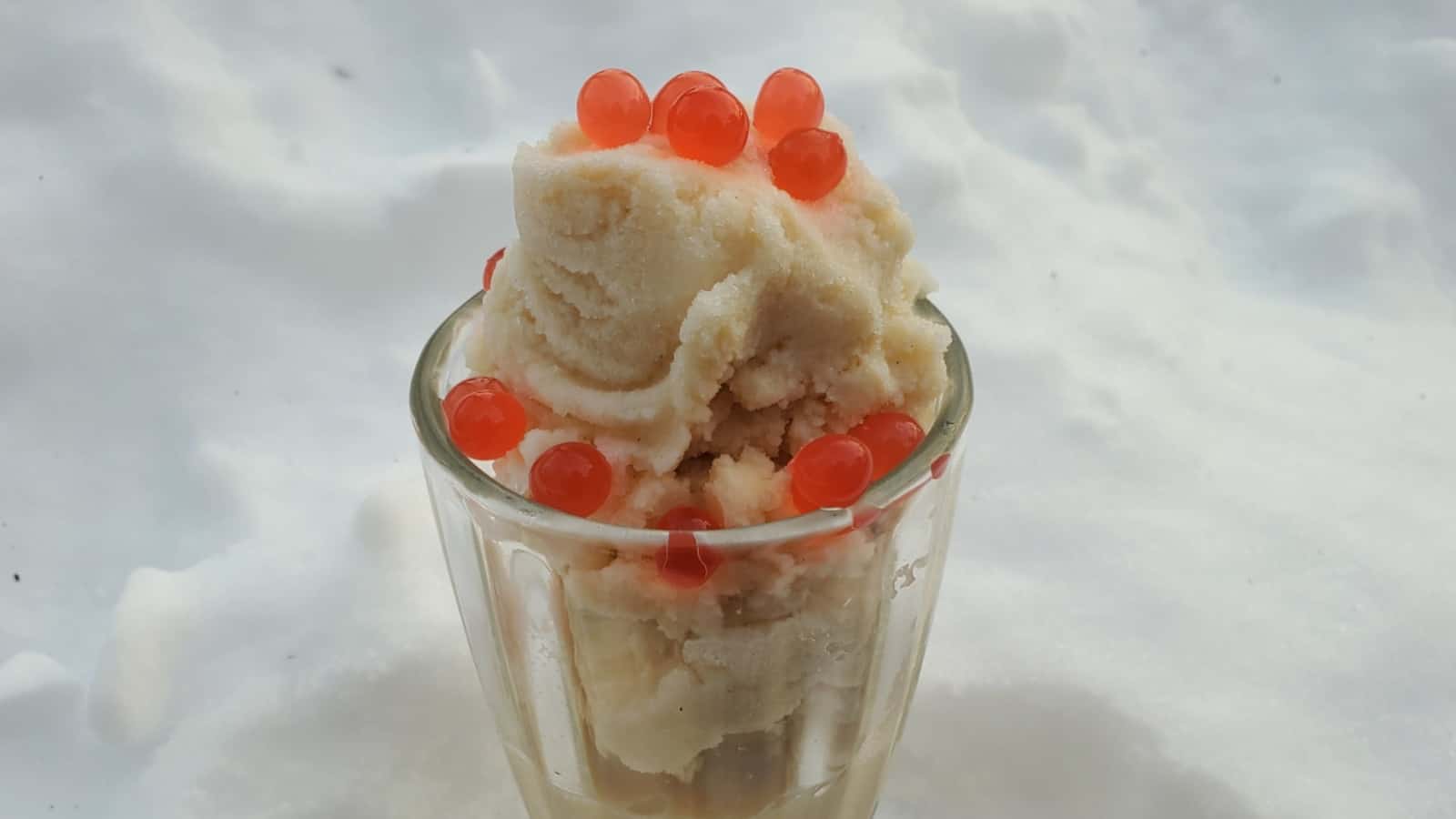 Brown sugar snow cream covered with boba.