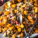 side view of wild rice pilaf with pomegranate and butternut squash.