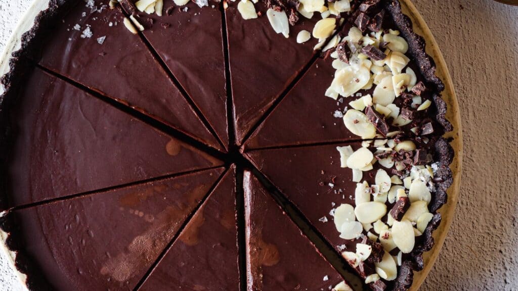 chocolate tart sliced into pieces