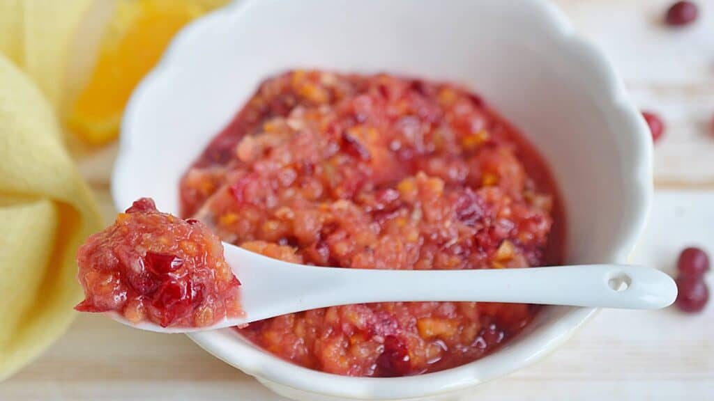 Cranberry relish on spoon.