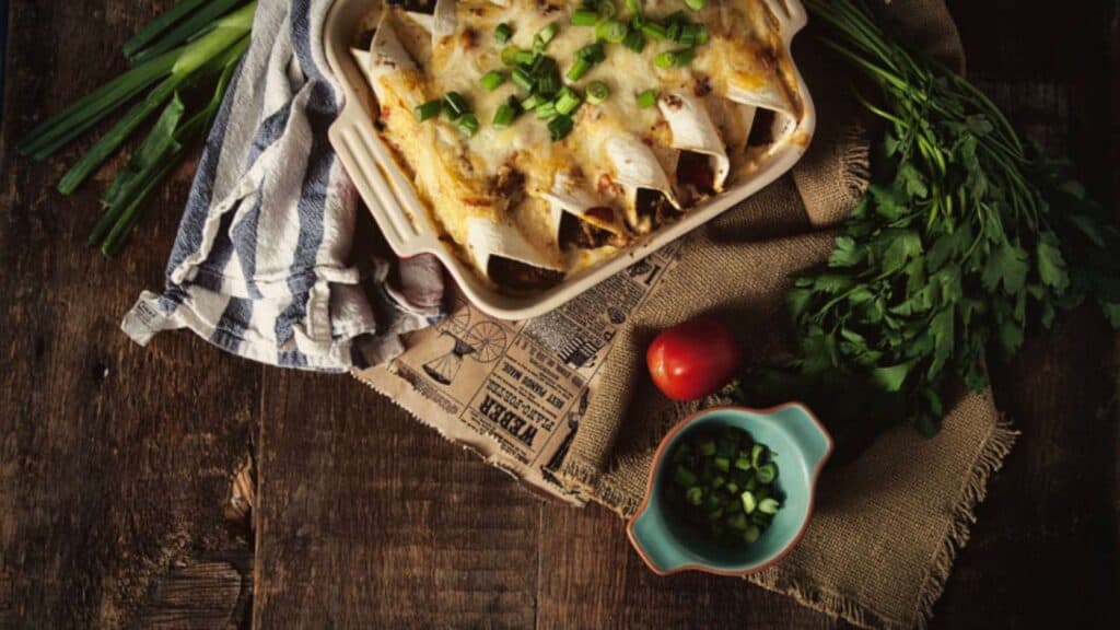 Casserole dish with cajun enchiladas.