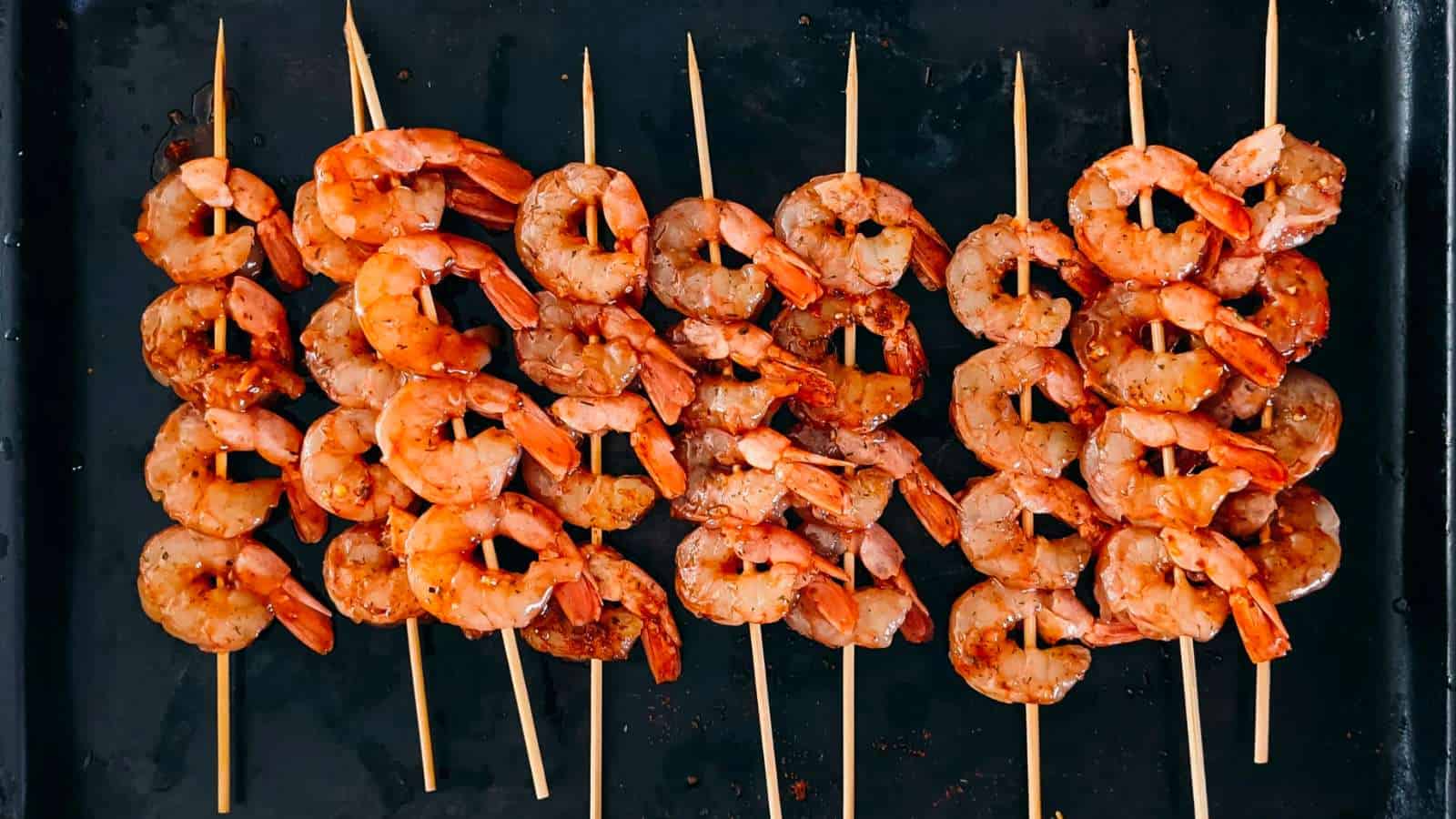 https://fooddrinklife.com/wp-content/uploads/2023/06/Girl-Carnivore-Grilled-Shrimp-Skewers.jpg
