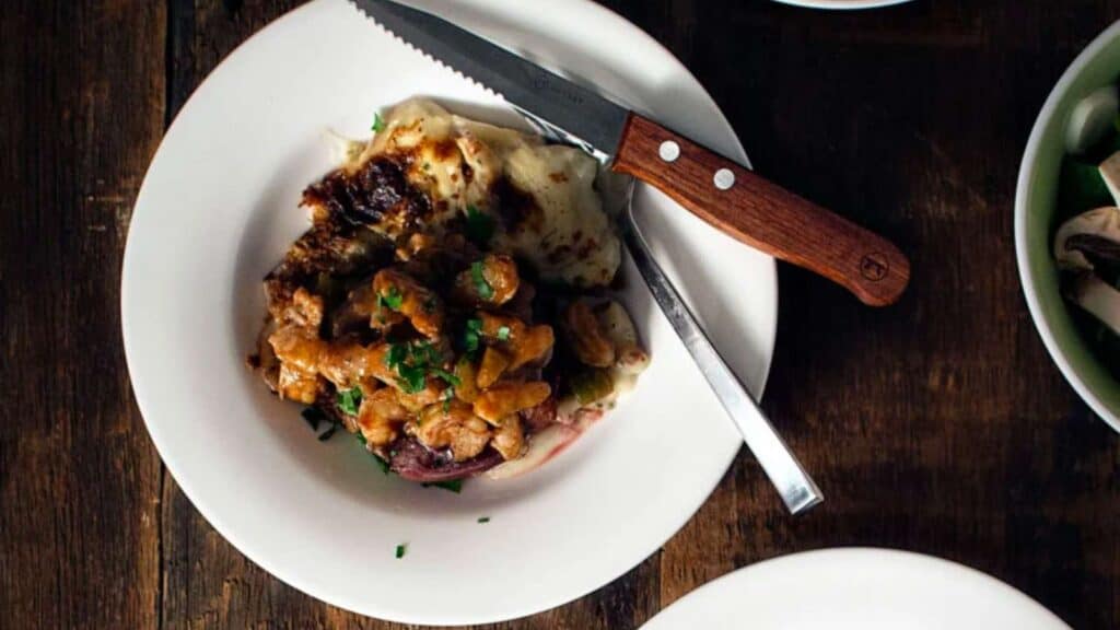 Shrimp étouffée on top of grilled filet mignon.