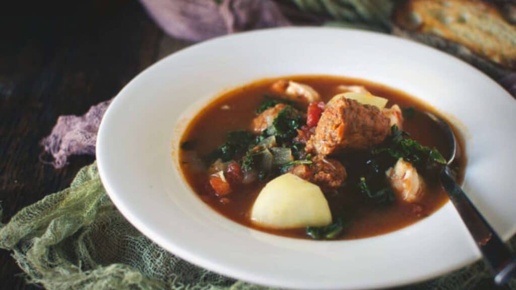 Bowl of shrimp and chorizo stew.