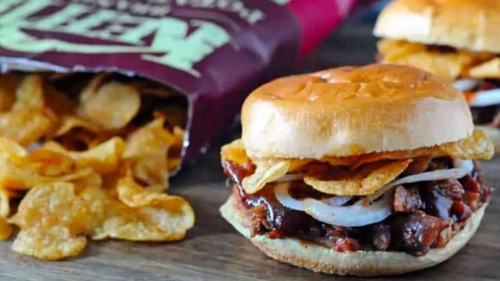 Bourbon BBQ Pork Sandwich topped with potato chips.