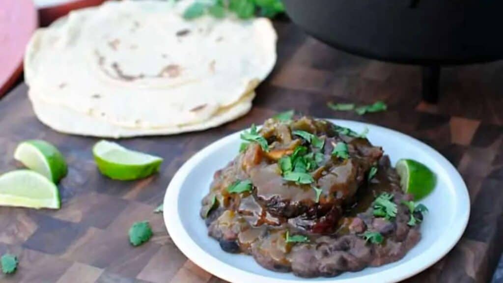 Braised pork shank topped with gravy.