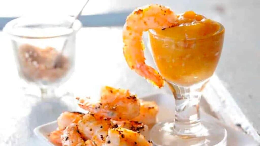 Grilled coconut shrimp with dipping sauce.