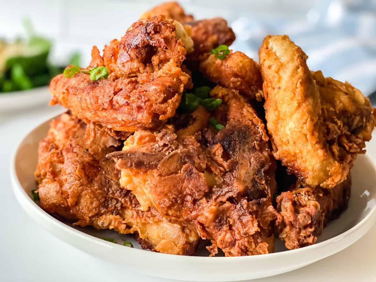 A plate with fried chicken on it.