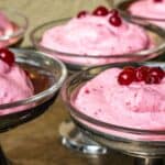 Red Currant Fluff inside glass serving bowls.