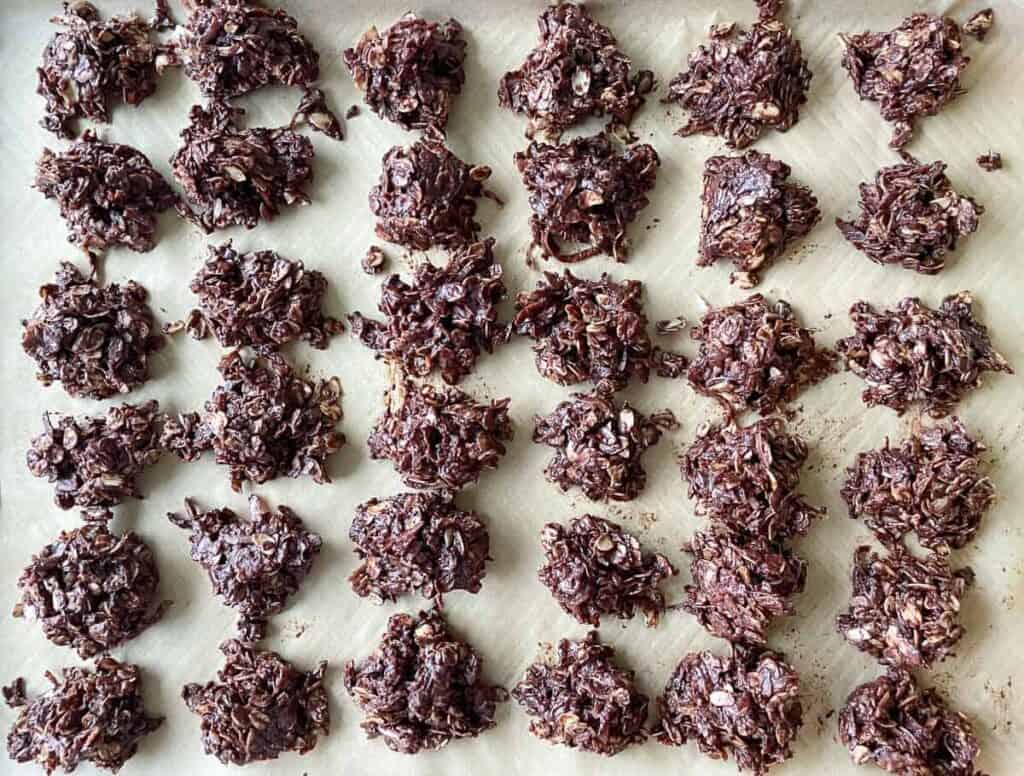 A full cookie sheet of no bake chocolate cookies.
