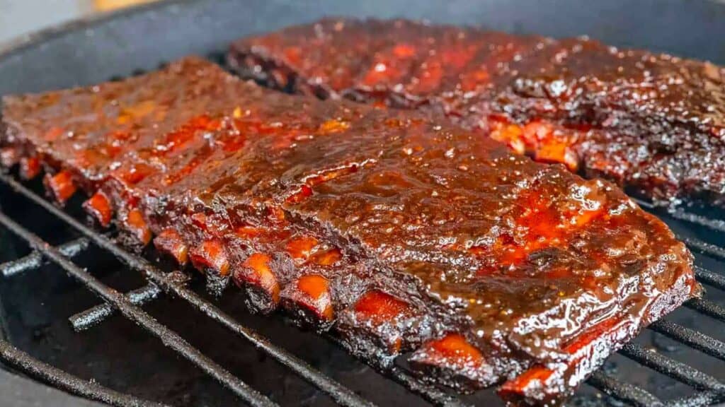 2 racks of St. Louis style ribs on the smoker.