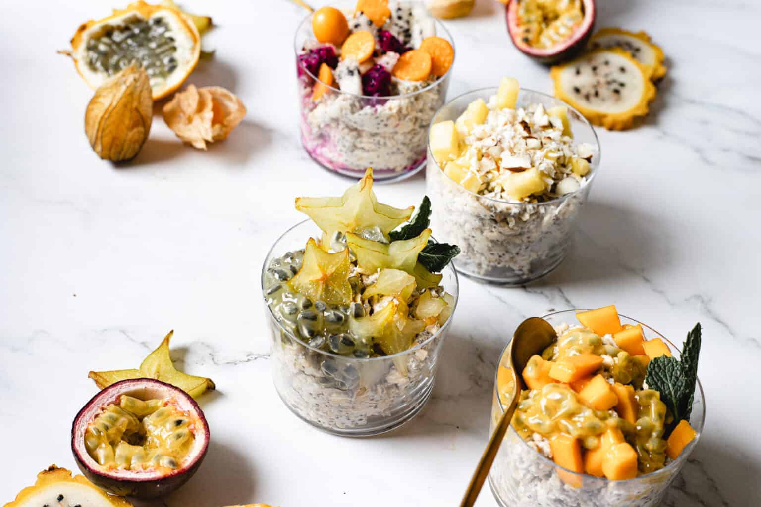 Four combinations of vegan overnight oats with fruit