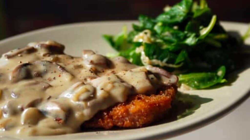 Pork schnitzel with gravy.